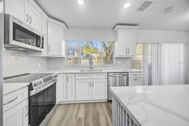 Building Photo - 11728 Raintree Dr