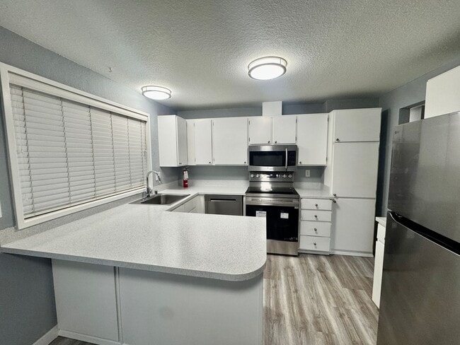 Building Photo - Two Bedroom Duplex Unit