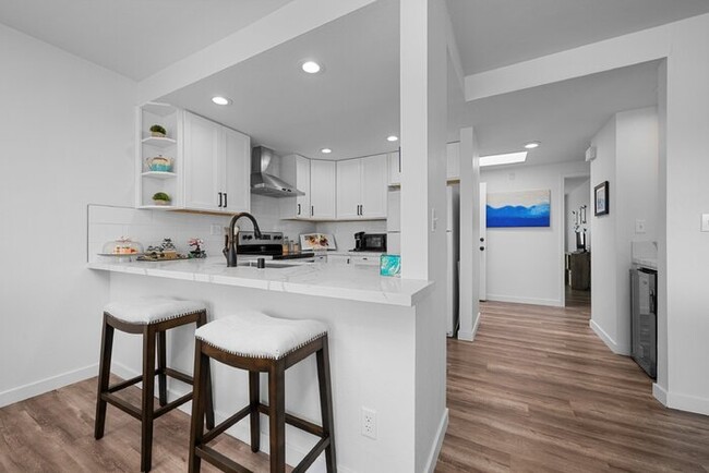 Building Photo - Beautifully remodeled 2 BR 2 BA condo w/ i...