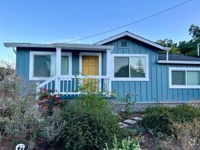 Building Photo - Fully Furnished Comfort + Rare Central A/C...