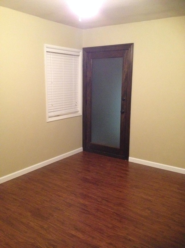 Bedroom with private patio entrance - 2421 Rockefeller Ln