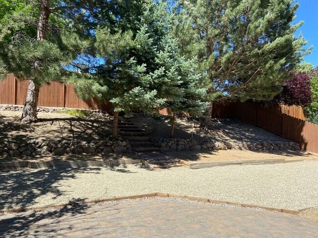 Building Photo - Coming Up Roses - NW Reno 4 Bedroom/3 Car Garage Single Story House