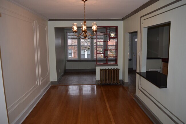 Building Photo - Regal Rowhome! 3 Beautiful Finished Levels!