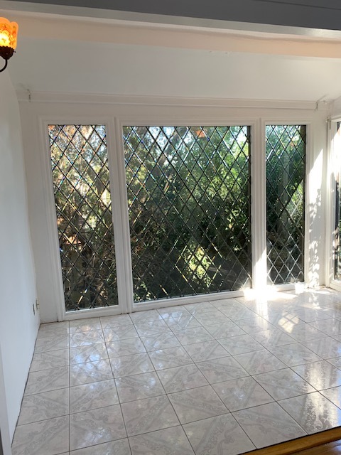 Bedroom extension with gorgeous, leaded windows, viewing nature - 365 Beloit Ave