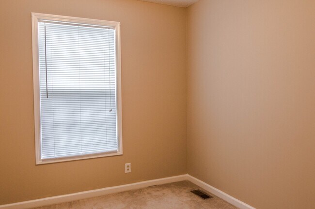 Building Photo - Pet Friendly Three Bedroom with Bonus!