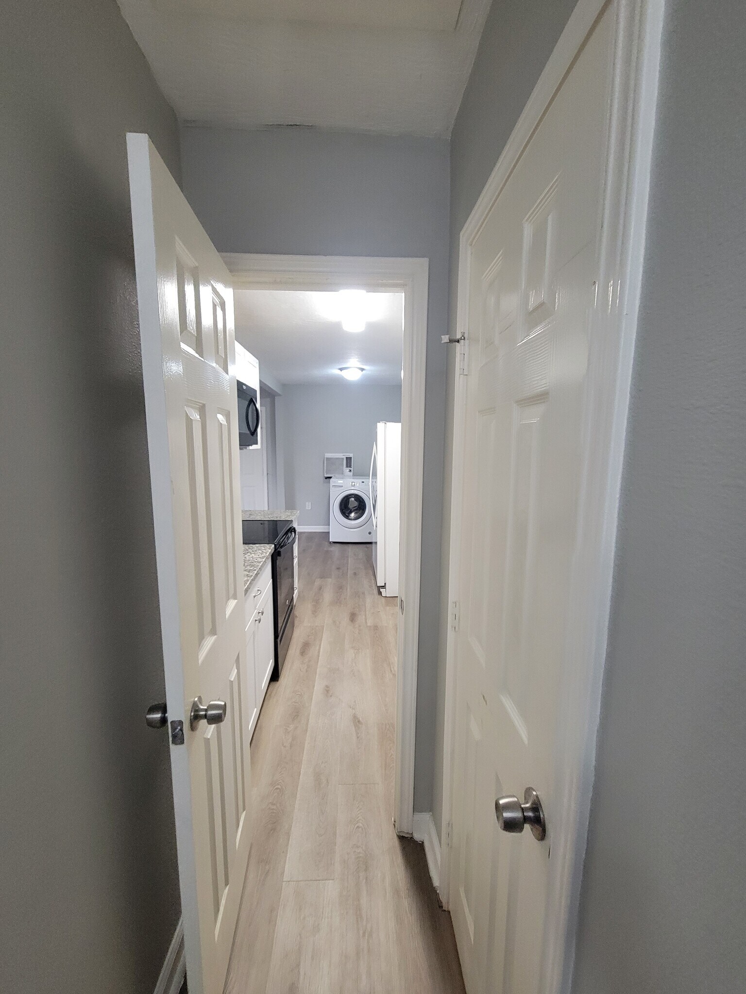 Exiting Bathroom into the kitchen area - 320 S Ashbel St