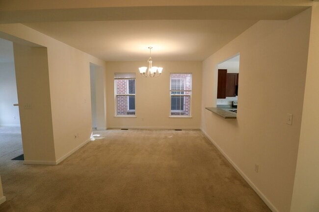 Building Photo - Spacious 4BR Home with Garage Steps from C...
