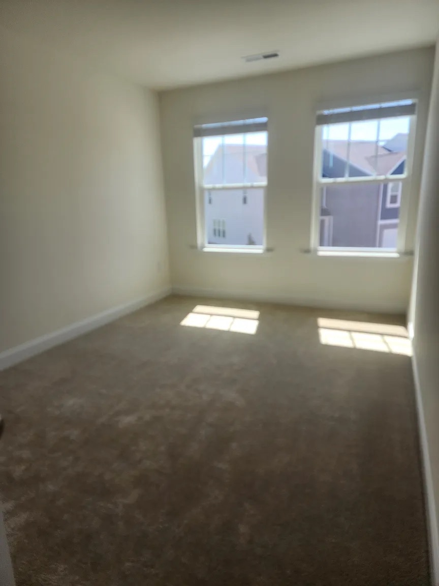 Building Photo - Room in Townhome on Caddis Bnd