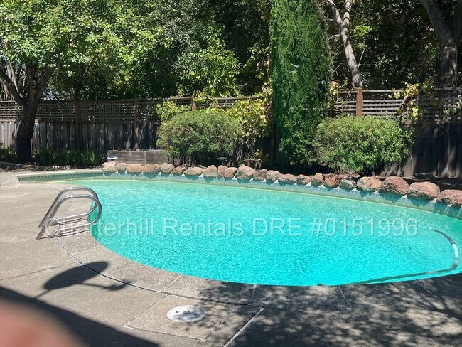 Building Photo - **Spacious 4-Bedroom Home with Pool in Desirable Rincon Valley**