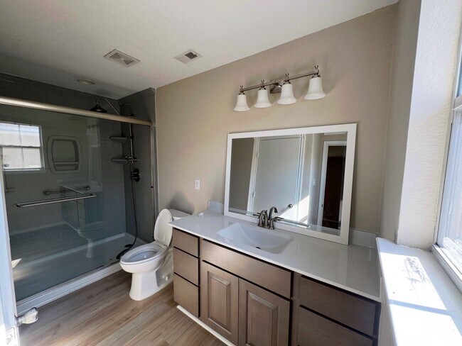 Building Photo - NEW PAINT, FLOORING, APPLIANCES & ROOF  | ...