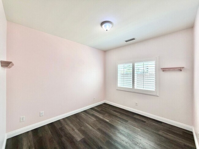 Building Photo - Beautifully Renovated 4 Bedroom Home with INCLUDED Solar, Large Backyard & Gazebo