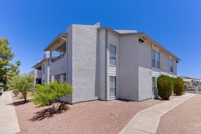 Building Photo - Charming 2 Bed, 2 Bath Condo with Fireplace & Balcony! 89011
