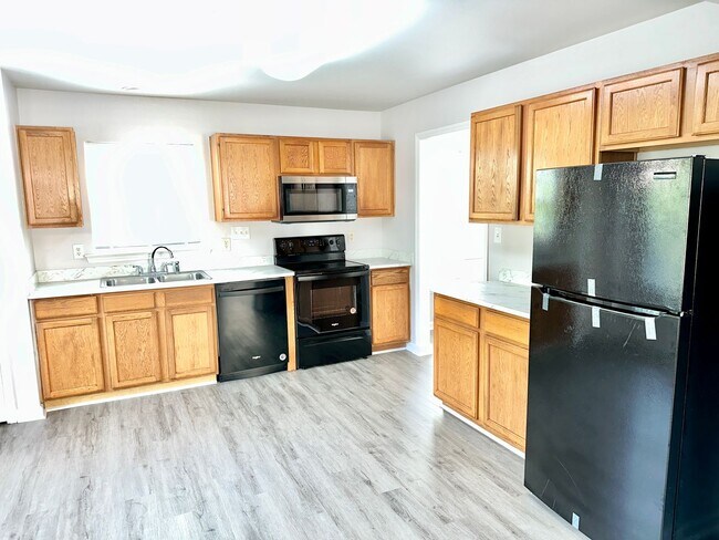 Building Photo - Updated 4BD, 2.5BA Raleigh Home With a 2-C...