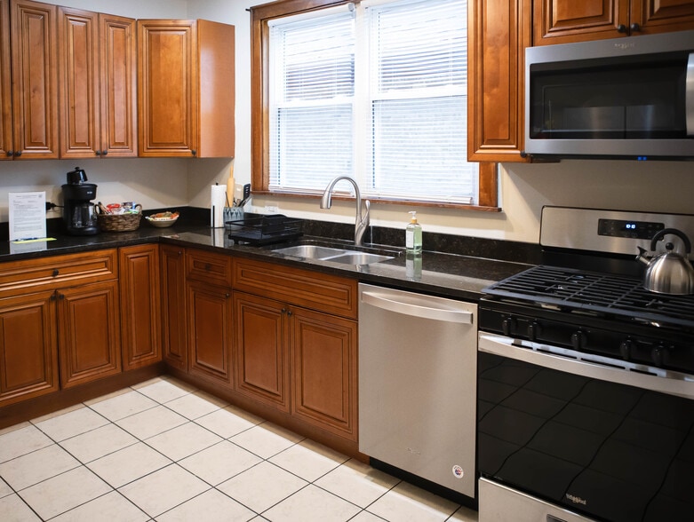 Kitchen with new SS dishwasher, gas stove/oven and over-the-counter microwave - 2018 Lake St