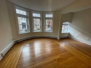 Building Photo - $2480 | Studio Available Now | Heat & Hot Water Included | Convenient Brookline Location