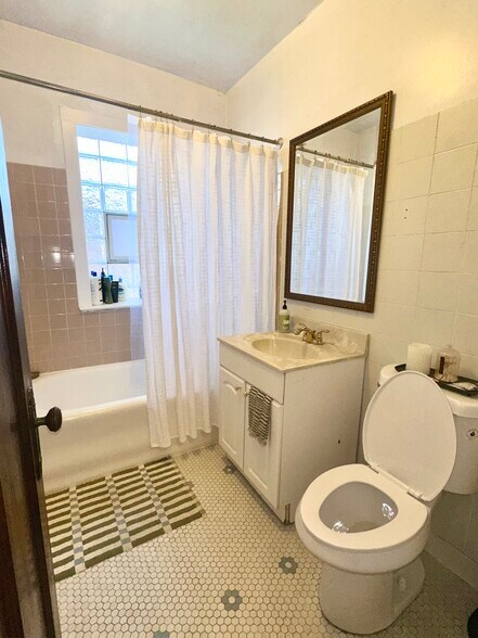 new toilet - 4036 N Mozart St