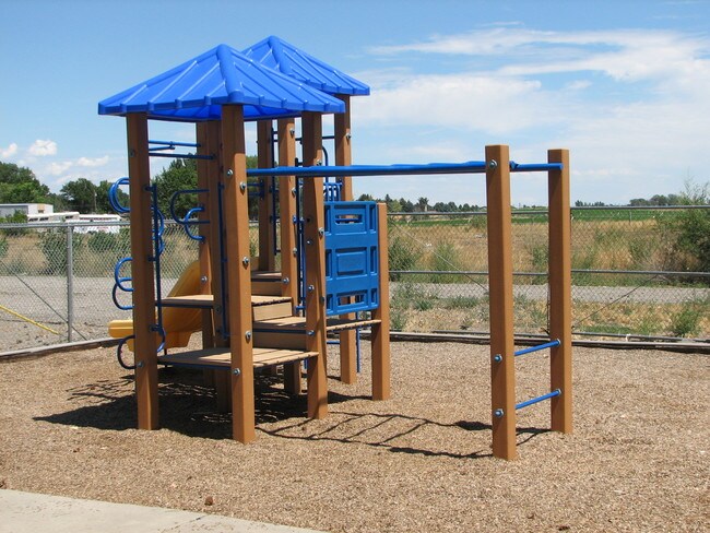 Building Photo - Evergreen Village Apartments
