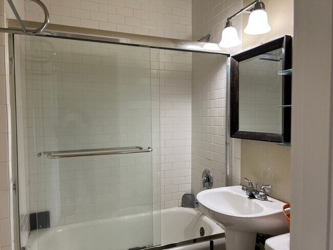 Building Photo - Classic Living at the Novell! Close to UW ...
