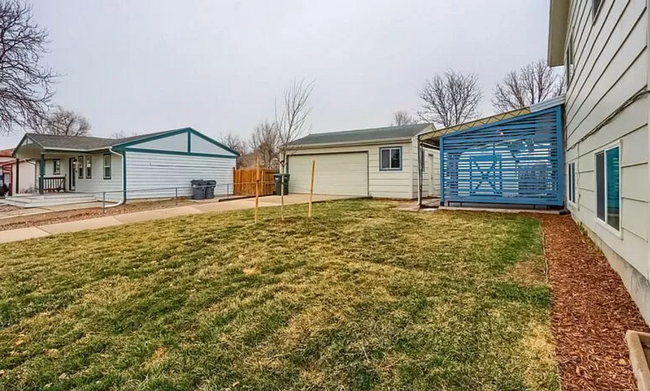 Building Photo - Charming & Spacious 5-Bedroom Home! Detach...