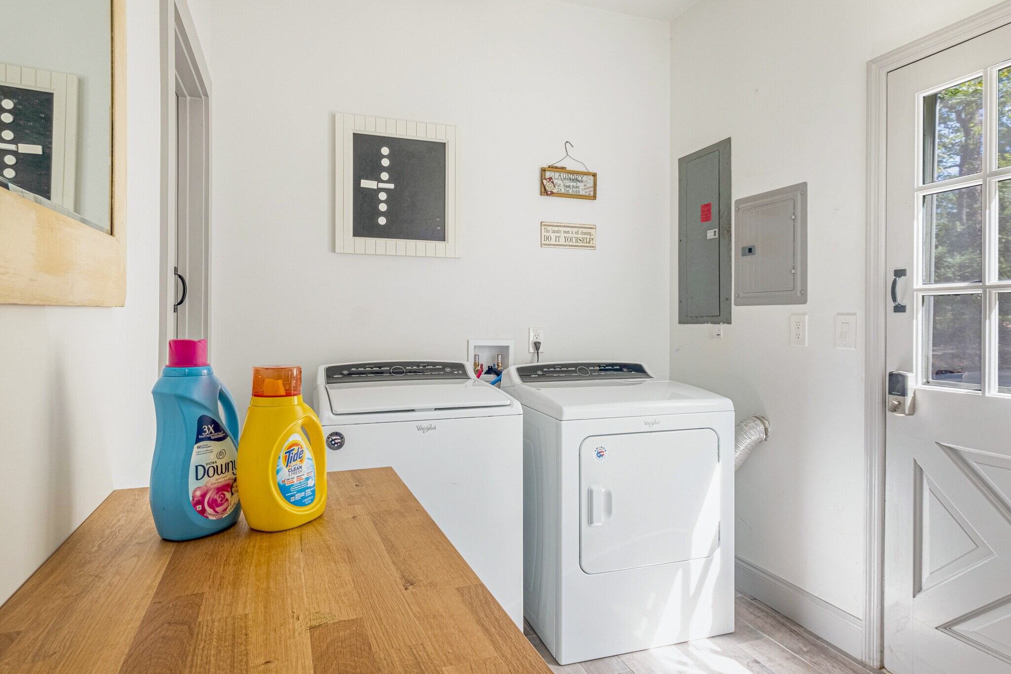 Shared laundry room — thoughtfully designed for efficiency and convenience. - 5460 Scofield Rd