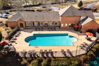 Aerial view of the clubhouse and pool - The Oaks of St. Clair