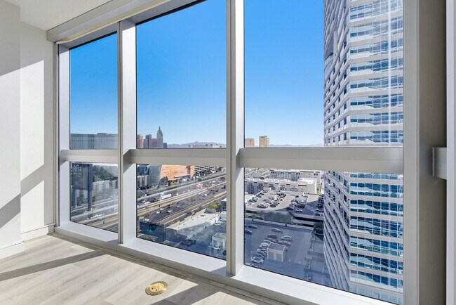 Building Photo - Martin 1905-Stunning Strip Views from this 2Bd Residence