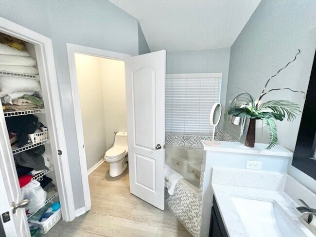 Building Photo - Lake Nona!! Spectacular 4X2 in Gated Nona Crest! All tile flooring!! 2 car garage! Move in April ...