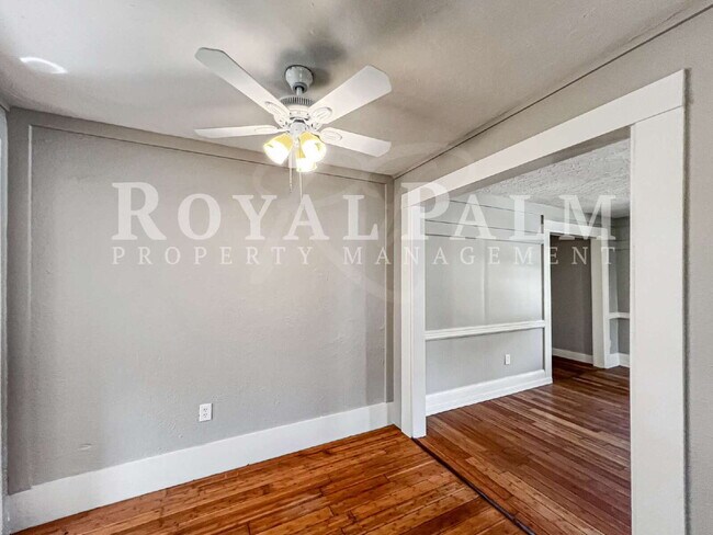 Building Photo - Deck the halls or the French doors, because this charming century-old single family home is avail...