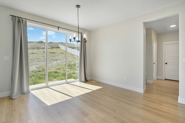 Building Photo - Pet-Friendly Upgraded 4-Bedroom Home with 3 Car Garage.