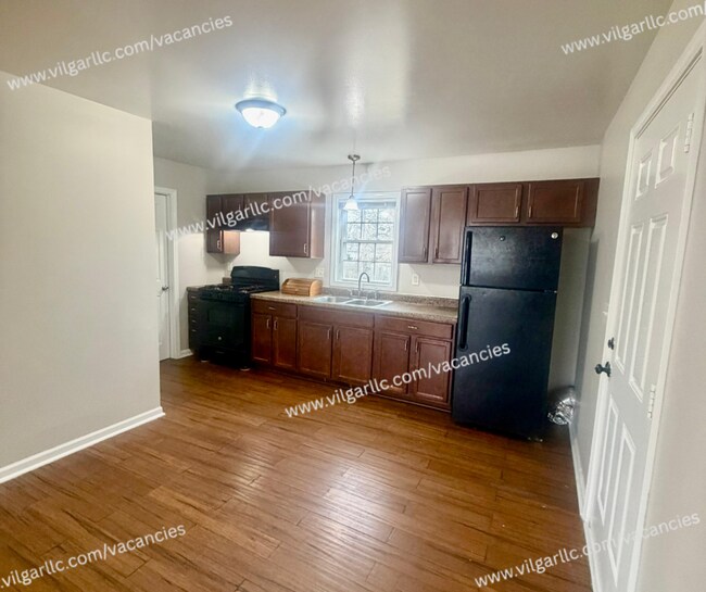 Building Photo - For rent - 4 Bedroom • 2 Full Bath • 2-Car Garage