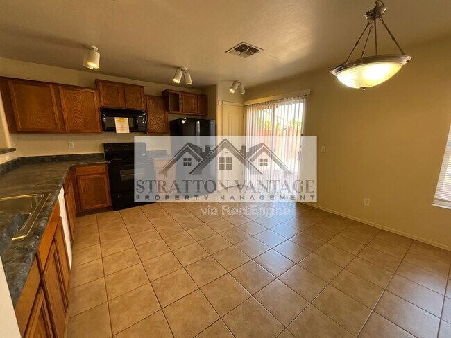 Building Photo - 11580 W Duran Ave