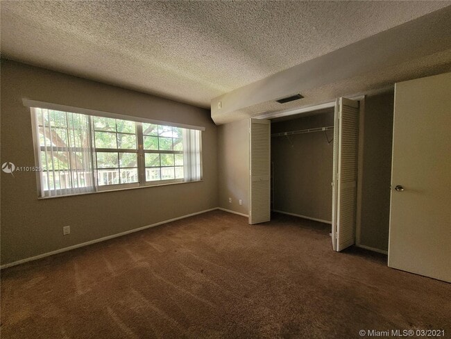 Building Photo - 4261 W Palm Aire Dr