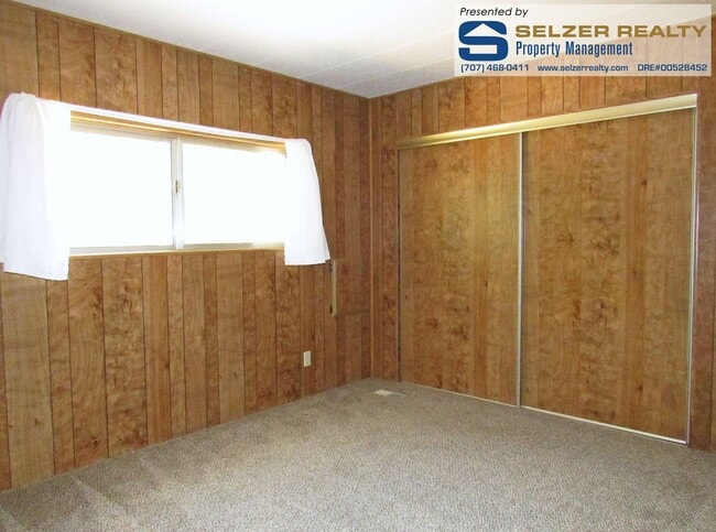 Building Photo - Roomy 2 bd. mobile w/ big yard in a countr...