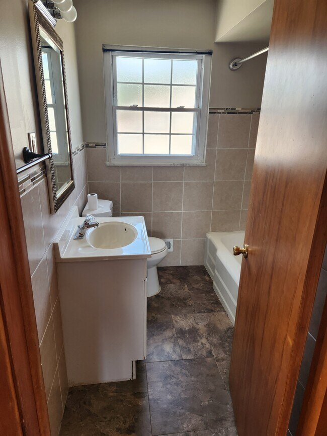 Building Photo - 7717 Kenton Ave