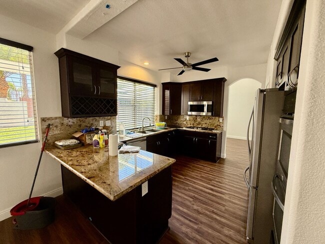 Building Photo - Spacious 4 Bedroom, 3 Bath Home with 3-Car Garage & Landscaping Included