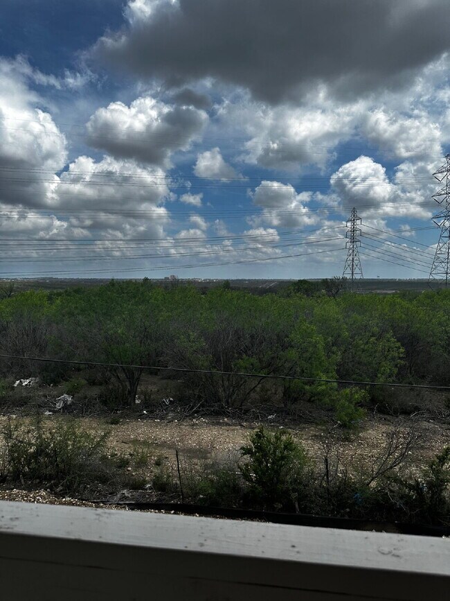 Building Photo - "Charming 3-Bedroom Duplex in San Antonio with Granite Elegance!"