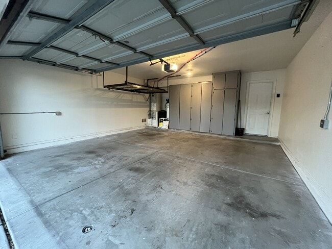 Building Photo - "Charming 4-Bed Oasis with Granite Touch & a Beautiful Pool"