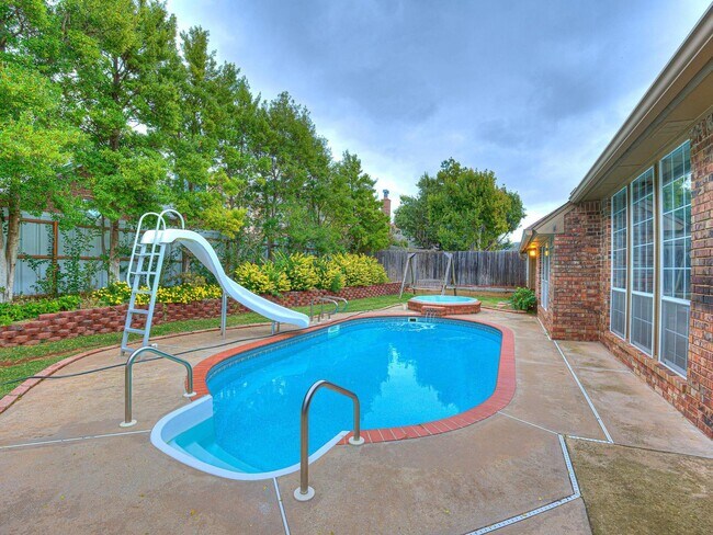Building Photo - 4 Bedrooms - 3 Bathrooms - 3 Car Garage - ...