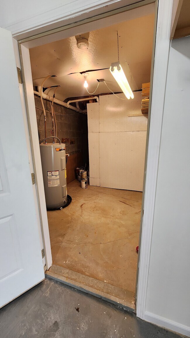 Storage room main level - 833 Plantation Dr