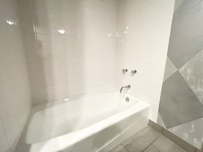 Building Photo - Gorgeous Furnished Pearl District Condo - ...