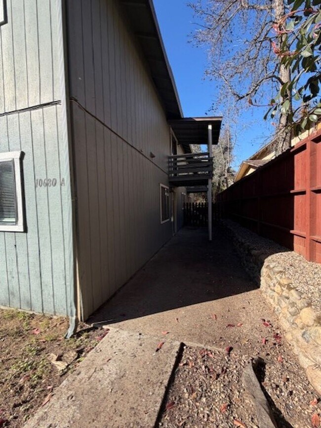 Building Photo - New Paint AND a Yard with a picket fence!