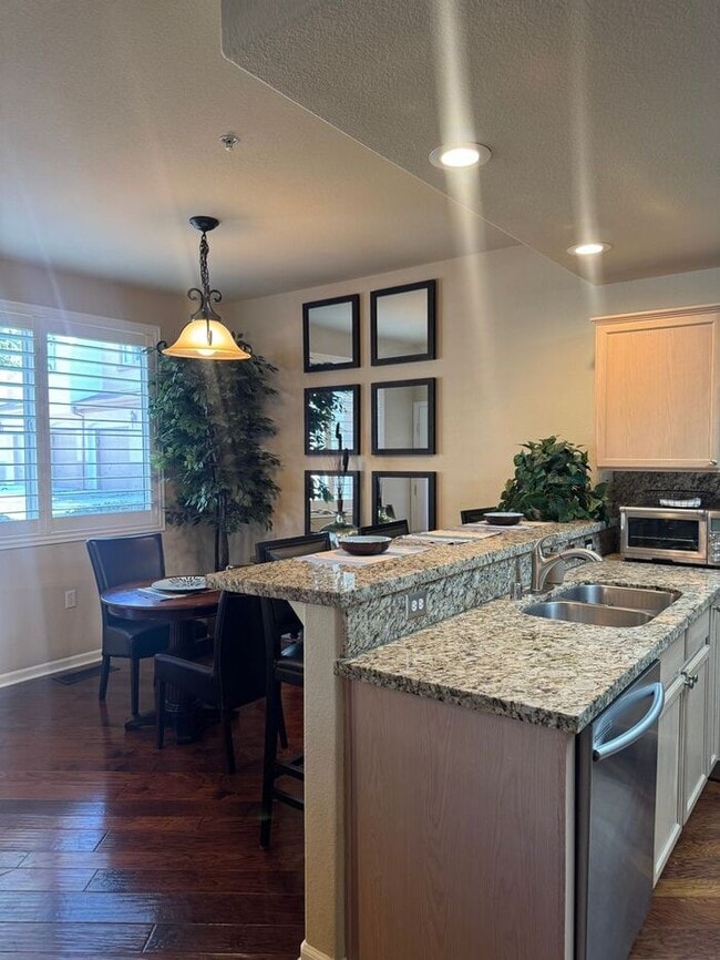 Building Photo - WOW-Factor Alert: Fully Furnished & Remodeled 2BD/2BA First Floor Condo in Wingfield Springs!