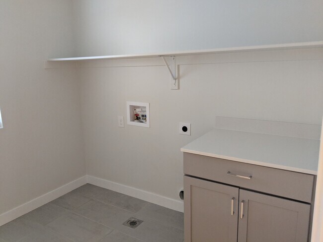 Building Photo - Available Now | Spacious 3-Bedroom Home wi...