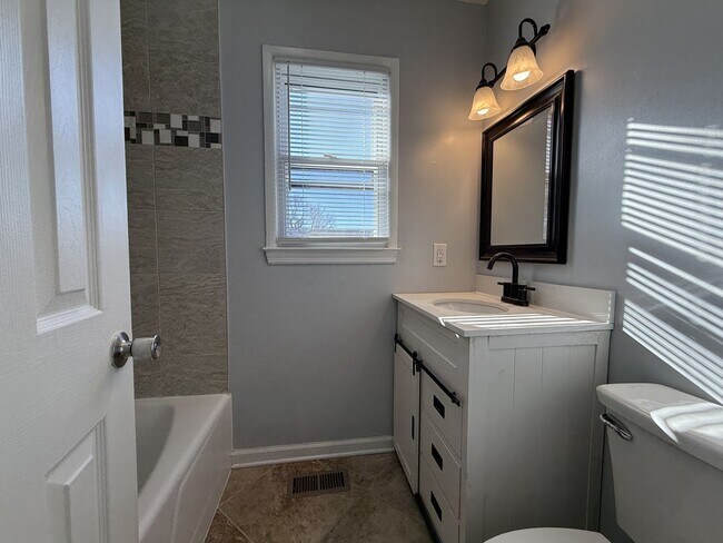 Building Photo - Tastefully Updated 4 Bedroom Home.