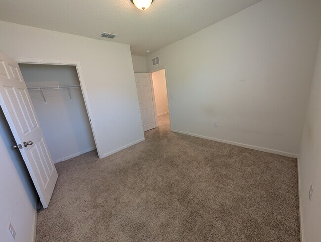 Building Photo - Modern 4-Bedroom Home with Large Backyard in Quiet SW Palm Bay – Available Mid-June