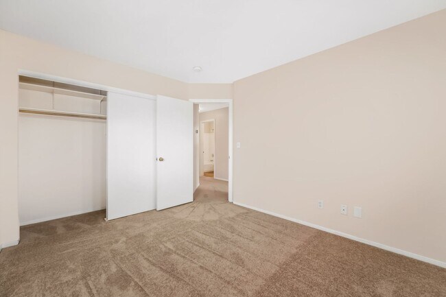 Building Photo - Gated Living with Community Pool & Thoughtfully Designed Open Layout!