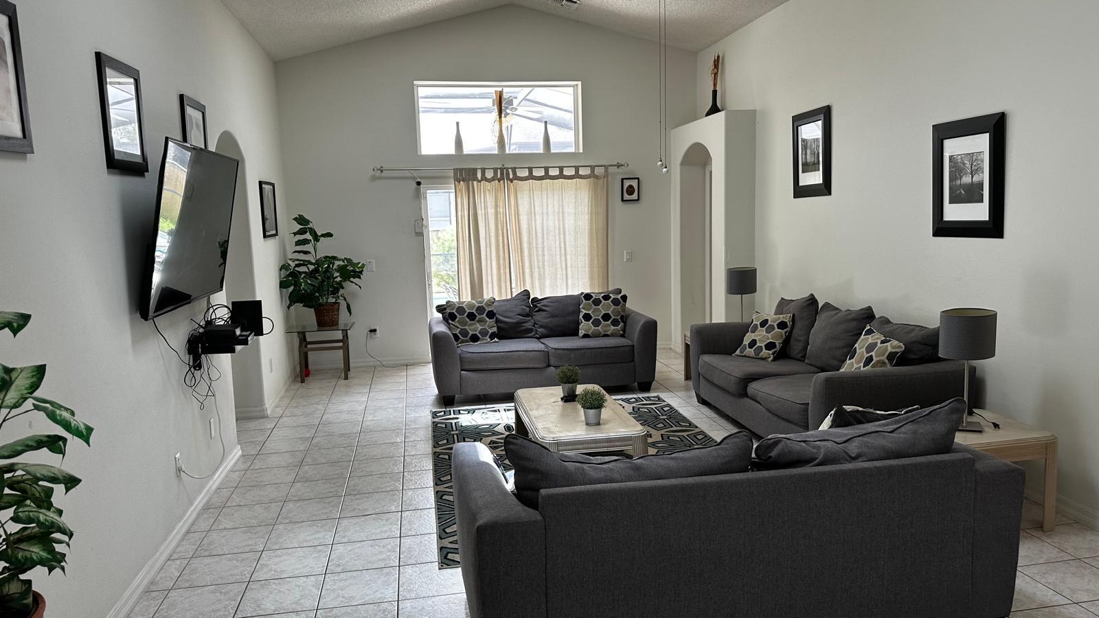 Living room Door to pool - 2651 Oneida Loop