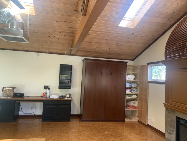 Desk, Pull down (very comfortable mattress), Linen shelves - 14715 Greenleaf St