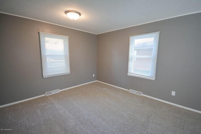 Building Photo - Cape Cod style home - completely updated throughout!