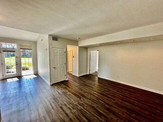 Building Photo - "Spacious 2-Bed, 2-Bath Condo with Pool Ac...